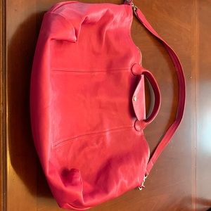 Overnight bag. Plenty of room! Laid flat width is 22W, 15 inch long.